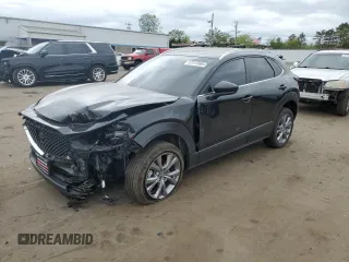 2023 Mazda CX-30 S Select with VIN 3MVDMBBM7PM511387, listed as a Copart auction lot 57515985 with 25,594 mi miles and Salvage title. Bid and sale history available at DreamBid. Image 1.