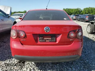 2010 Volkswagen Jetta Limited Edition with VIN 3VWAX7AJ5AM104821, listed as a Copart auction lot 52355435 with 98,260 mi miles and Salvage title. Bid and sale history available at DreamBid. Image 6.
