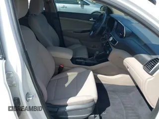 2019 Hyundai Tucson SE with VIN KM8J2CA43KU870933, listed as a IAAI auction lot 41972884 with 53,029 mi miles. Bid and sale history available at carsss.com. Image 5.