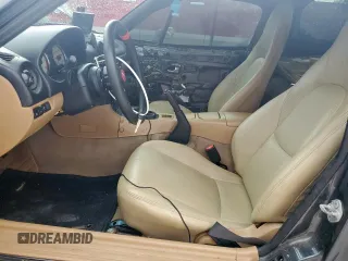 2001 Mazda MX-5 Miata with VIN JM1NB353210210976, listed as a Copart auction lot 59653695 with 152,250 mi miles and Salvage title. Bid and sale history available at DreamBid. Image 7.