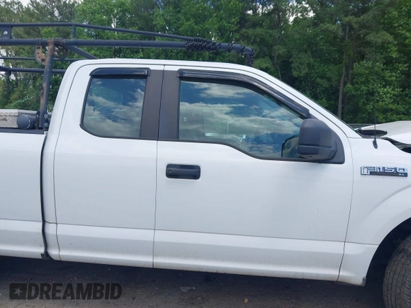 2018 Ford F-150 XL with VIN 1FTEX1CB5JFE55932, listed as a IAAI auction lot 42298917 with 143,923 mi miles and . Bid and sale history available at DreamBid. Image 13.