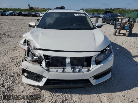 2018 Honda Civic EX с VIN 19XFC2F78JE037033, выставлен на аукционе Copart как лот 57363035 с пробегом 44 820 миль миль и Списание • Salvage title. История ставок и продаж доступна на DreamBid. Изображение 5.