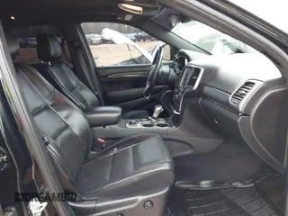 2018 Jeep Grand Cherokee High Altitude with VIN 1C4RJFCT5JC283704, listed as a IAAI auction lot 41613275 with 134,134 mi miles. Bid and sale history available at carsss.com. Image 5.