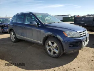 2012 Volkswagen Touareg Sport z VIN WVGFK9BP9CD000509, wystawiony jako Copart lot #48507095 z przebiegiem 164 283 mil mil oraz Szkoda całkowita • Salvage title. Historia ofert i sprzedaży dostępna na DreamBid. Obrazek 4.