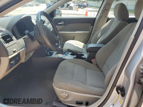 2010 Ford Fusion Hybrid с VIN 3FADP0L33AR171285, выставлен на аукционе Copart как лот 64983995 с пробегом 166 596 миль миль и Чистый • Clean title. История ставок и продаж доступна на DreamBid. Изображение 7.