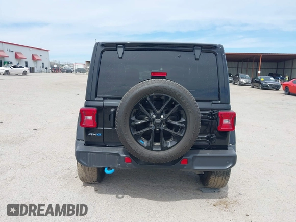 2022 Jeep Wrangler Unlimited Sahara with VIN 1C4JJXP69NW269462, listed as a IAAI auction lot 41759162 with 19,629 mi miles and . Bid and sale history available at DreamBid. Image 16.