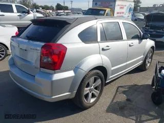 2010 Dodge Caliber SXT with VIN 1B3CB4HA3AD664526, listed as a IAAI auction lot 41401694 with 215,104 mi miles. Bid and sale history available at carsss.com. Image 4.