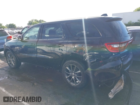 2018 Dodge Durango GT with VIN 1C4RDJDG6JC150039, listed as a IAAI auction lot 42319578 with 149,590 mi miles and . Bid and sale history available at DreamBid. Image 14.