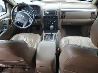 2002 Jeep Grand Cherokee z VIN 1J4GX38S72C152046, wystawiony jako Copart lot #57963095 z przebiegiem 204 576 mil mil oraz Szkoda całkowita • Salvage title. Historia ofert i sprzedaży dostępna na DreamBid. Obrazek 8.