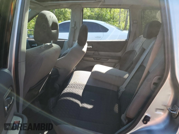 2006 Nissan X-Trail XE z VIN JN8BT08V76W200772, wystawiony jako Copart lot #62078634 z przebiegiem 234 102 mil mil oraz Szkody całkowita. Historia ofert i sprzedaży dostępna na DreamBid. Obrazek 10.