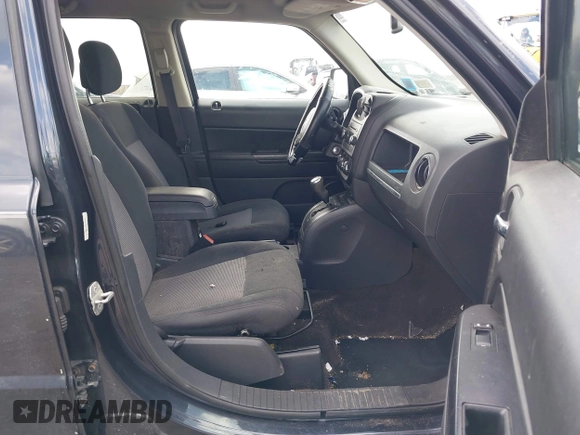2014 Jeep Patriot Latitude with VIN 1C4NJRFB9ED778409, listed as a IAAI auction lot 41952027 with 88,306 mi miles and . Bid and sale history available at DreamBid. Image 5.