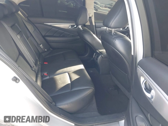 2014 Infiniti Q50 Sport with VIN JN1BV7AP9EM674097, listed as a IAAI auction lot 41741697 with 105,797 mi miles and . Bid and sale history available at DreamBid. Image 8.
