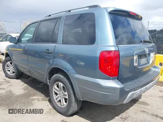 2005 Honda Pilot EX-L with VIN 2HKYF18505H527229, listed as a IAAI auction lot 41946751 with 190,455 mi miles. Bid and sale history available at carsss.com. Image 3.