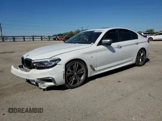 2018 BMW 5 Series M550i xDrive with VIN WBAJB9C51JB287233, listed as a Copart auction lot 55899505 with Not provided miles and Salvage title. Bid and sale history available at DreamBid. Image 1.