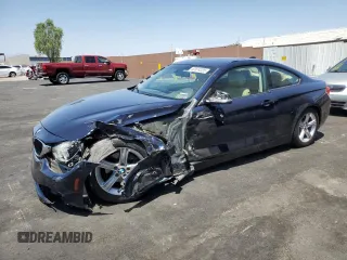 2014 BMW 4 Series 428i xDrive with VIN WBA3N9C59EK245883, listed as a Copart auction lot 62674235 with 106,580 mi miles and Salvage title. Bid and sale history available at DreamBid. Image 1.