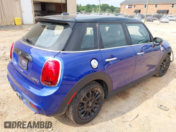 2021 MINI Hardtop 4 Door Cooper S with VIN WMWXU9C00M2N60370, listed as a IAAI auction lot 42426257 with 11,288 mi miles and . Bid and sale history available at DreamBid. Image 4.