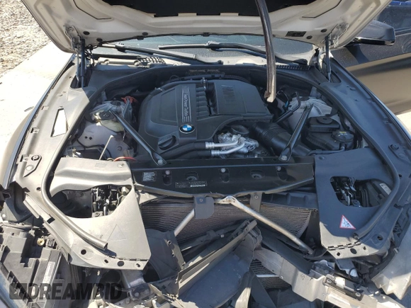 2015 BMW 6 Series 640i xDrive z VIN WBA6B8C53FD453909, wystawiony jako Copart lot #55292765 z przebiegiem 84 971 mil mil oraz Szkoda całkowita • Salvage title. Historia ofert i sprzedaży dostępna na DreamBid. Obrazek 11.