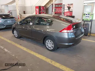 2010 Honda Insight LX with VIN JHMZE2H54AS040316, listed as a IAAI auction lot 41572246 with 142,850 mi miles and . Bid and sale history available at DreamBid. Image 3.