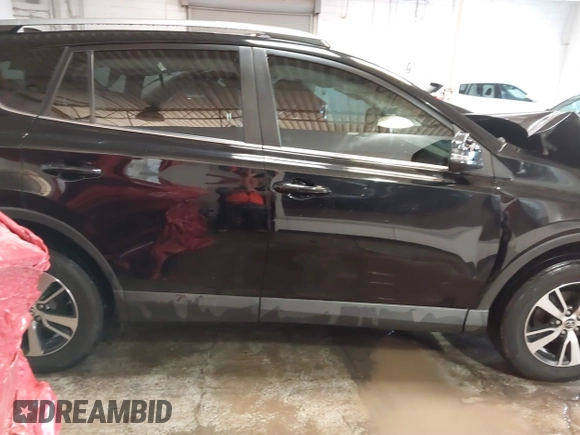 2018 Toyota RAV4 XLE with VIN 2T3WFREV1JW471931, listed as a IAAI auction lot 41332851 with 123,657 mi miles. Bid and sale history available at carsss.com. Image 14.