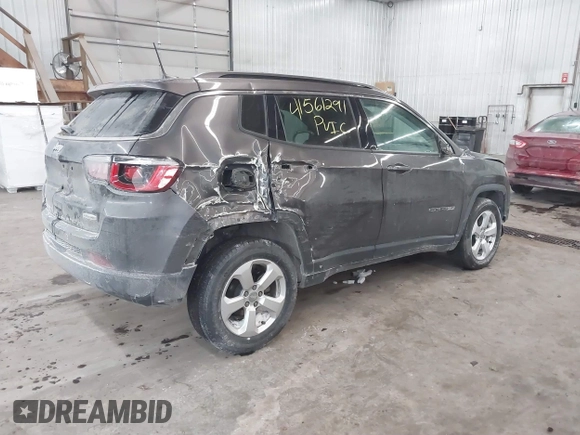 2019 Jeep Compass Altitude with VIN 3C4NJDBBXKT665843, listed as a IAAI auction lot 41561291 with 82,912 mi miles and . Bid and sale history available at DreamBid. Image 4.