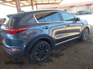 2019 Kia Sportage EX z VIN KNDPN3AC5K7539461, wystawiony jako IAAI lot #42180598 z przebiegiem 69 072 mil mil oraz . Historia ofert i sprzedaży dostępna na DreamBid. Obrazek 4.