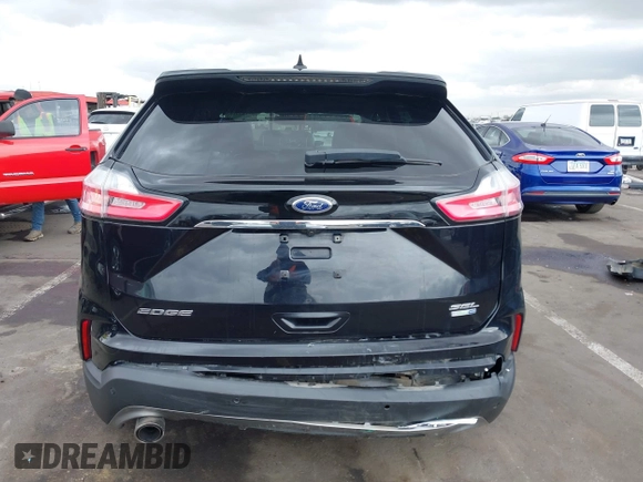 2020 Ford Edge SEL z VIN 2FMPK4J9XLBA78278, wystawiony jako IAAI lot #42181490 z przebiegiem 236 730 mil mil oraz . Historia ofert i sprzedaży dostępna na DreamBid. Obrazek 16.