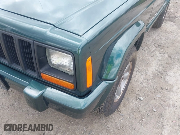 1999 Jeep Cherokee Sport with VIN 1J4FF68S5XL677243, listed as a IAAI auction lot 42221329 with 293,808 mi miles and . Bid and sale history available at DreamBid. Image 6.