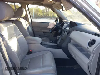 2015 Honda Pilot EX-L with VIN 5FNYF4H57FB006655, listed as a IAAI auction lot 41822385 with 125,915 mi miles and . Bid and sale history available at carsss.com. Image 5.