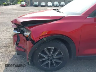 2018 Mazda CX-5 Grand Touring with VIN JM3KFBDM2J0448555, listed as a IAAI auction lot 42449282 with 65,770 mi miles and . Bid and sale history available at DreamBid. Image 6.