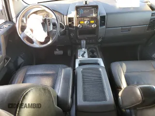 2014 Nissan Titan S with VIN 1N6AA0EC2EN511673, listed as a Copart auction lot 41703295 with 81,662 mi miles and Salvage Title. Bid and sale history available at DreamBid. Image 8.
