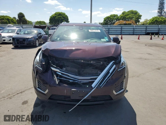 2018 Cadillac XT5 Luxury AWD с VIN 1GYKNDRS9JZ137516, выставлен на аукционе Copart как лот 56017215 с пробегом 52 409 миль миль и Списание • Salvage title. История ставок и продаж доступна на DreamBid. Изображение 5.