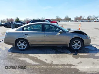2005 Nissan Altima SE z VIN 1N4BL11D65C148642, wystawiony jako IAAI lot #42056330 z przebiegiem 81 328 mil mil oraz . Historia ofert i sprzedaży dostępna na DreamBid. Obrazek 13.