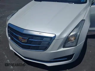 2016 Cadillac ATS Luxury Collection RWD z VIN 1G6AB5RX4G0133529, wystawiony jako IAAI lot #42314146 z przebiegiem 158 897 mil mil oraz . Historia ofert i sprzedaży dostępna na DreamBid. Obrazek 6.
