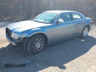 2006 Chrysler 300 C with VIN 2C3KA63HX6H518989, listed as a IAAI auction lot 41741341 with 134,636 mi miles. Bid and sale history available at carsss.com. Image 2.