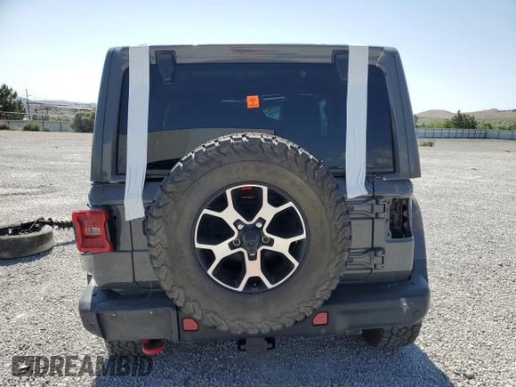 2020 Jeep Wrangler Unlimited Rubicon with VIN 1C4HJXFG4LW334160, listed as a Copart auction lot 59486435 with Not provided miles and Salvage title. Bid and sale history available at DreamBid. Image 6.