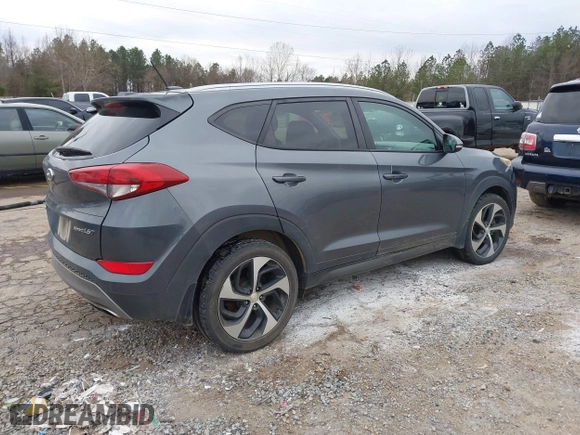 2016 Hyundai Tucson Sport with VIN KM8J33A21GU254828, listed as a IAAI auction lot 41297692 with 134,394 mi miles. Bid and sale history available at carsss.com. Image 4.