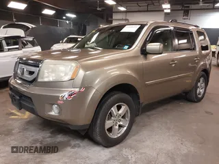 2009 Honda Pilot EX-L with VIN 5FNYF48639B011686, listed as a IAAI auction lot 41958353 with 155,382 mi miles and . Bid and sale history available at carsss.com. Image 17.