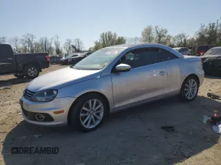 2012 Volkswagen Eos Komfort with VIN WVWBW7AHXCV015407, listed as a Copart auction lot 52719025 with 126,408 mi miles and Clean Title. Bid and sale history available at DreamBid. Image 1.