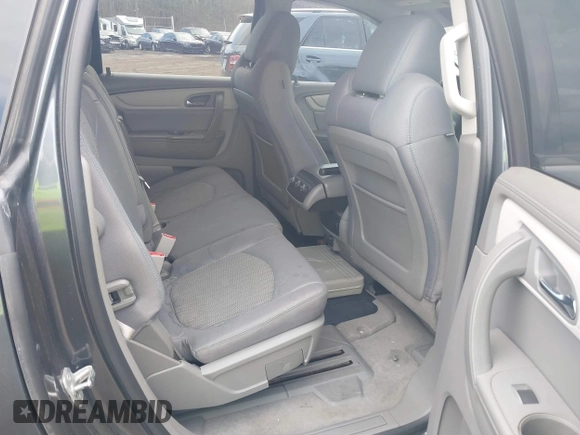 2014 Chevrolet Traverse LS z VIN 1GNKVFKD3EJ187997, wystawiony jako IAAI lot #41834781 z przebiegiem 150 994 mil mil oraz . Historia ofert i sprzedaży dostępna na DreamBid. Obrazek 8.