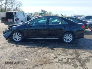 2013 Toyota Camry L with VIN 4T1BF1FK1DU666784, listed as a IAAI auction lot 41869487 with 99,396 mi miles. Bid and sale history available at carsss.com. Image 14.