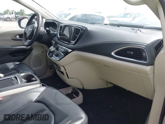 2023 Chrysler Pacifica Hybrid Touring L with VIN 2C4RC1L75PR611901, listed as a IAAI auction lot 42626500 with 44,156 mi miles and . Bid and sale history available at DreamBid. Image 5.
