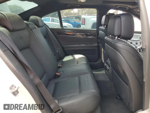 2013 BMW 7 Series 740i with VIN WBAYA6C5XDC995172, listed as a Copart auction lot 60288685 with 28,144 mi miles and Salvage title. Bid and sale history available at DreamBid. Image 10.
