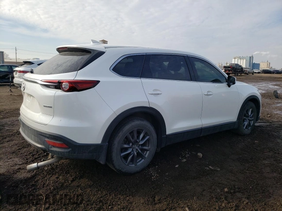 2020 Mazda CX-9 Touring with VIN JM3TCACY2L0407342, listed as a Copart auction lot 47590235 with 59,667 mi miles and Salvage title. Bid and sale history available at DreamBid. Image 3.