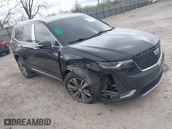 2021 Cadillac XT6 Premium Luxury with VIN 1GYKPDRS2MZ141406, listed as a IAAI auction lot 42014495 with 62,929 mi miles and . Bid and sale history available at DreamBid. Image 1.