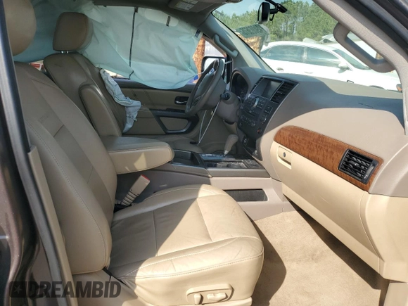 2015 Nissan Armada Platinum z VIN 5N1BA0NF1FN608684, wystawiony jako Copart lot #49003675 z przebiegiem 150 236 mil mil oraz Szkoda całkowita • Salvage title. Historia ofert i sprzedaży dostępna na DreamBid. Obrazek 7.