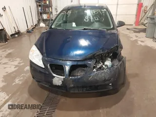 2009 Pontiac G6 GT 1SA z VIN 1G2ZH57NX94121112, wystawiony jako IAAI lot #41898403 z przebiegiem 155 100 mil mil oraz . Historia ofert i sprzedaży dostępna na DreamBid. Obrazek 6.