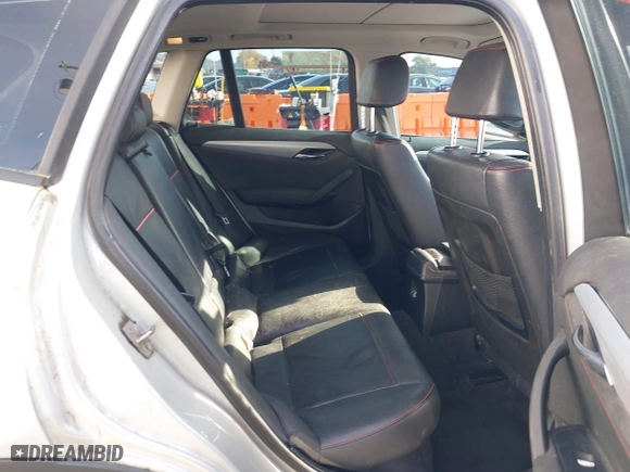 2014 BMW X1 sDrive28i with VIN WBAVM1C58EVW52847, listed as a IAAI auction lot 40779553 with 151,076 mi miles. Bid and sale history available at carsss.com. Image 8.