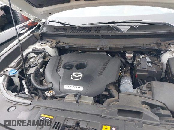 2016 Mazda CX-9 Grand Touring with VIN JM3TCADY0G0113779, listed as a IAAI auction lot 41466750 with 58,035 mi miles and . Bid and sale history available at DreamBid. Image 10.
