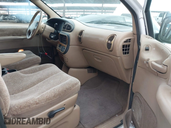 1999 Plymouth Voyager Grand SE z VIN 1P4GP44G5XB637050, wystawiony jako IAAI lot #41702235 z przebiegiem 335 309 mil mil oraz . Historia ofert i sprzedaży dostępna na DreamBid. Obrazek 5.