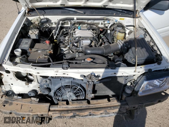 2001 Isuzu Rodeo S z VIN 4S2DM58W114306215, wystawiony jako Copart lot #85287914 z przebiegiem 157 844 mil mil oraz Szkoda całkowita • Salvage title. Historia ofert i sprzedaży dostępna na DreamBid. Obrazek 12.
